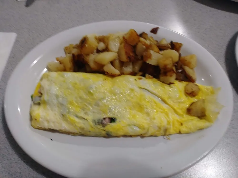 The Works Omlet with Home Fries
