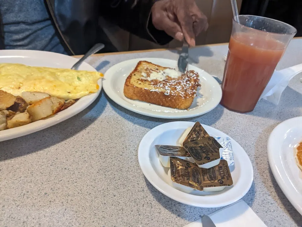 Works Omlet with Home Fries French Toast
